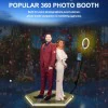 Capture Your Spin Two individuals stand back-to-back on the 360 Hexagon LED Photo Booth 40" platform. Its automatic spin feature ensures dynamic shots, while the ring light and camera setup capture vibrant moments against a colorful, blurred backdrop.